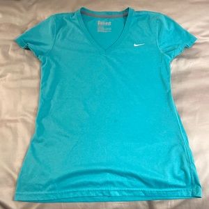 Short sleeved Nike athletic shirt. Size small. Good condition.